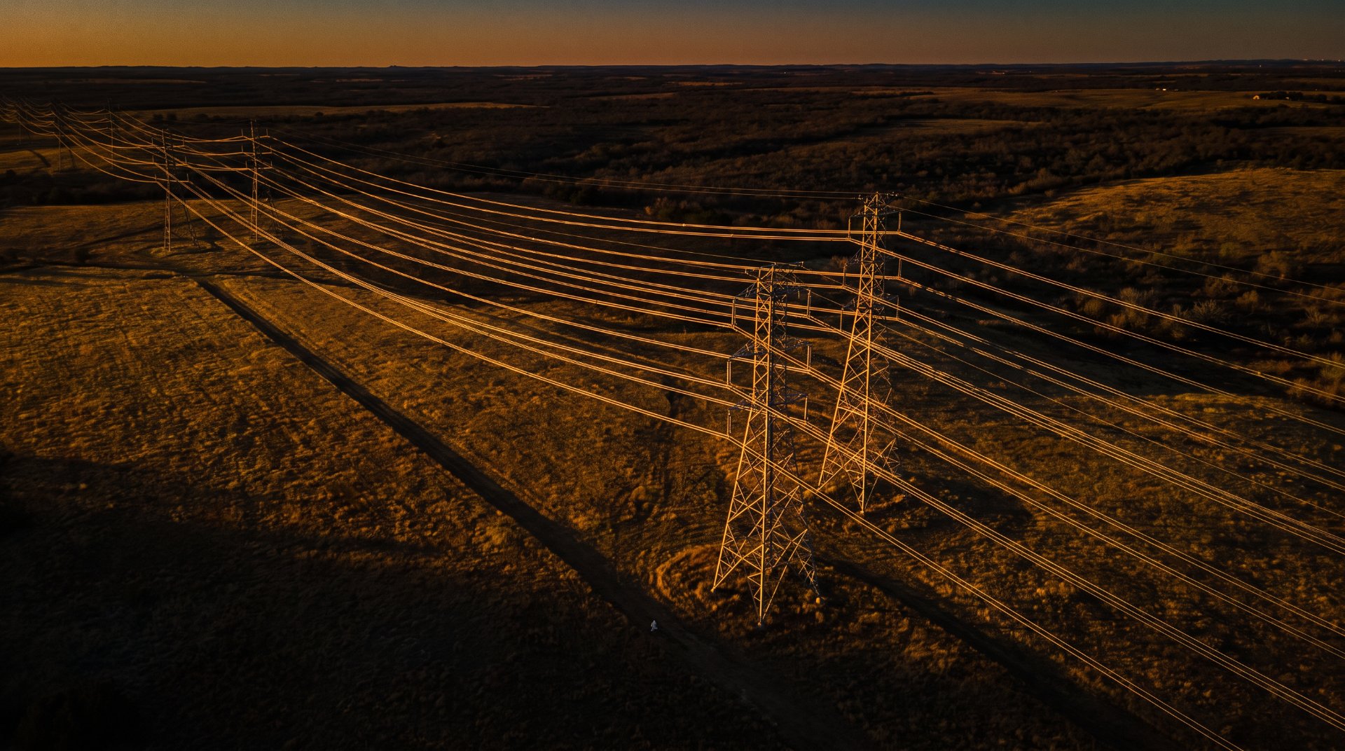 High-voltage transmission corridor across open ranchland